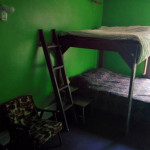 Room 4 with double over queen sized bed in The Arlington aka HI South Algonquin Backpackers Hostel in Maynooth Ontario