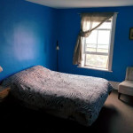 Room 9 with queen sized bed in The Arlington aka HI South Algonquin Backpackers Hostel in Maynooth Ontario