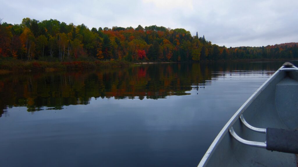 canoe on booth lake in autumn