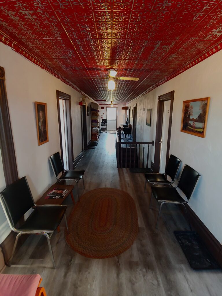 3rd Floor Hallway at the Arlington with red tin ceiling